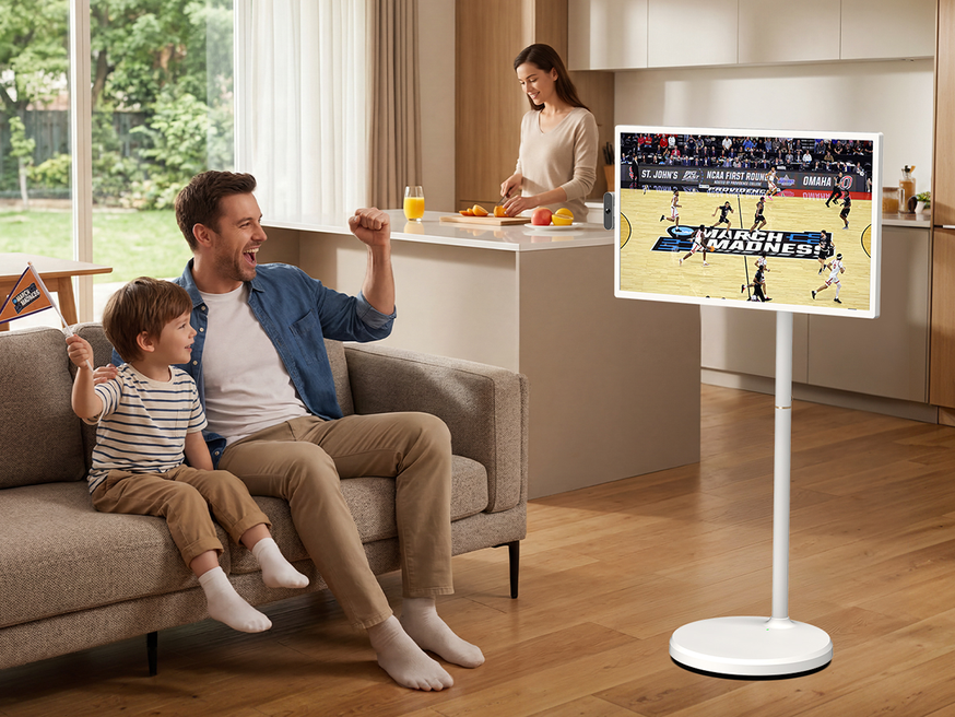 Family enjoys March Madness on portable TV stand in modern living room