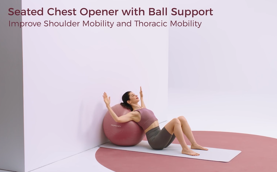 Pregnant woman performs seated chest opener using stability ball for shoulder and thoracic mobility