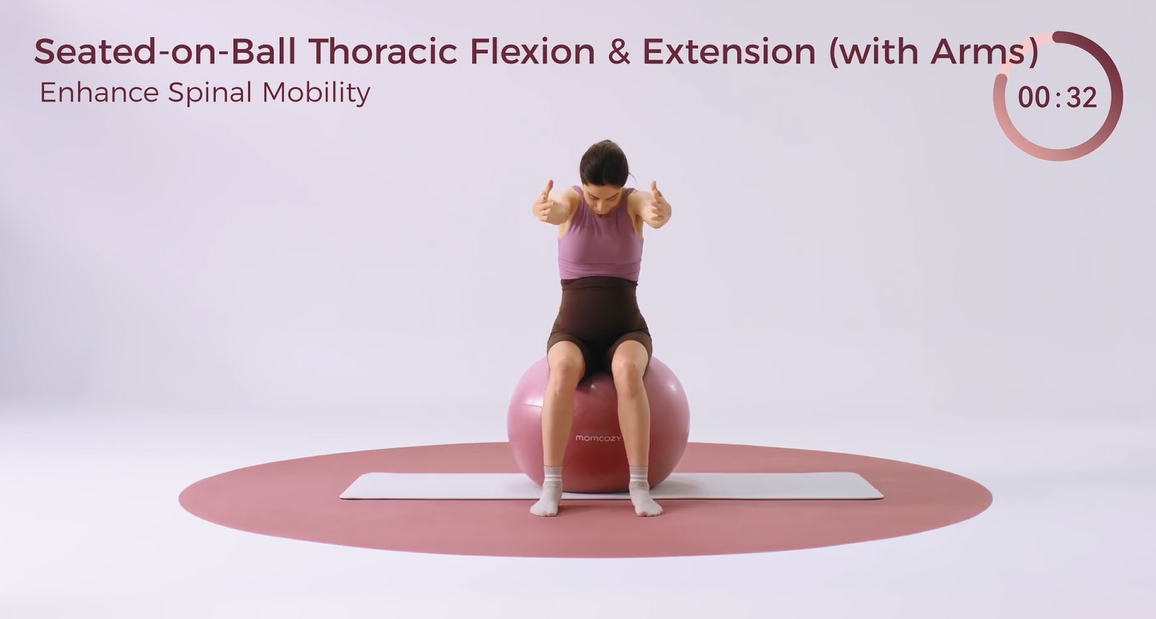 Woman performing seated thoracic extension with arms on stability ball